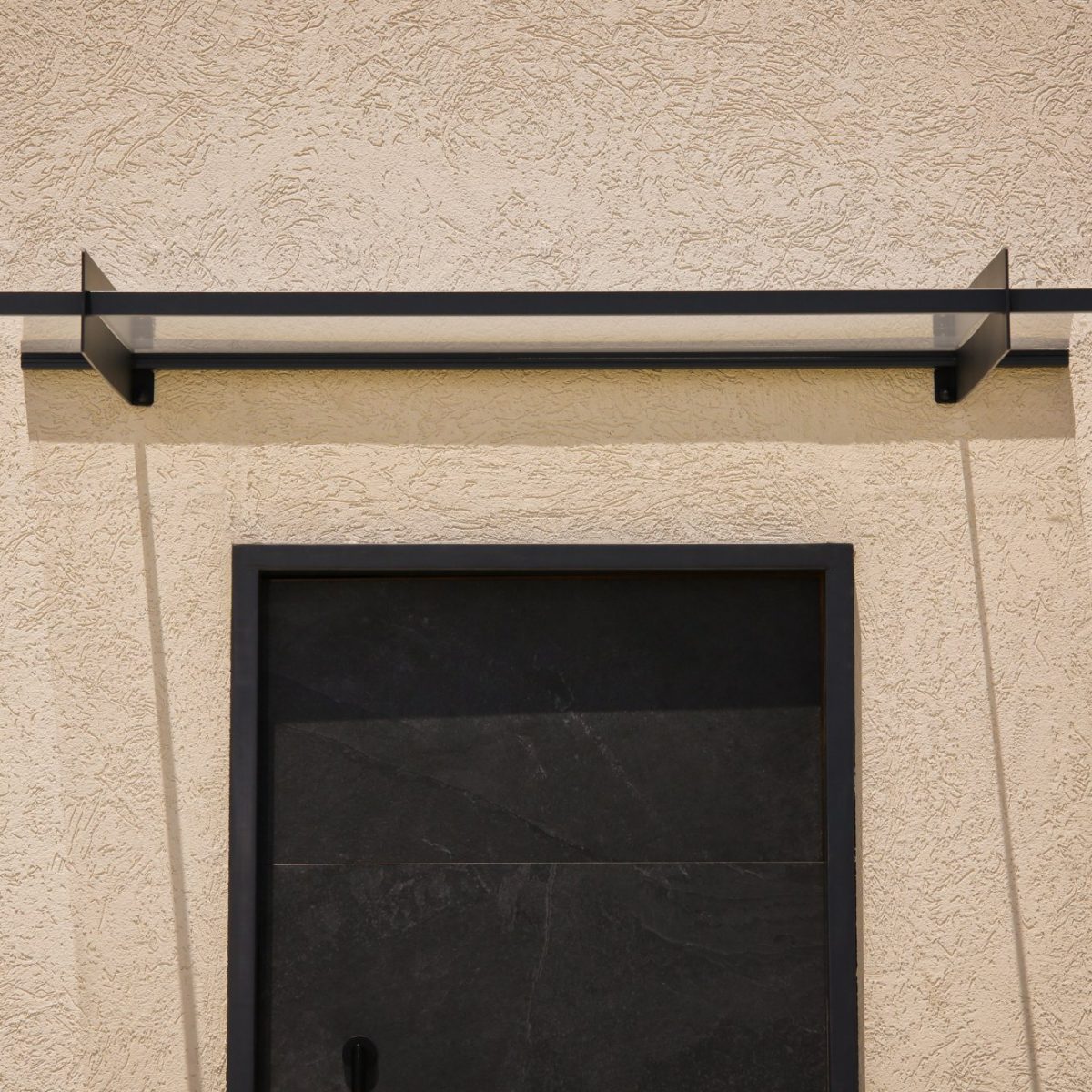 Palram-Canopia_Door-Awnings_Nancy_3x5_1x1.5_Grey_Main_2