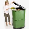 Model-putting-food-scrapes-in-bin-1-scaled-1.jpg