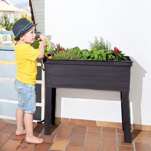 Urban_Balkon-Hochbeet_Kind.jpg